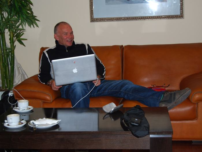 Photo by @TonyJaveaF1: Peter in his improvised office in Jerez - the glitz and glamour of Formula 1